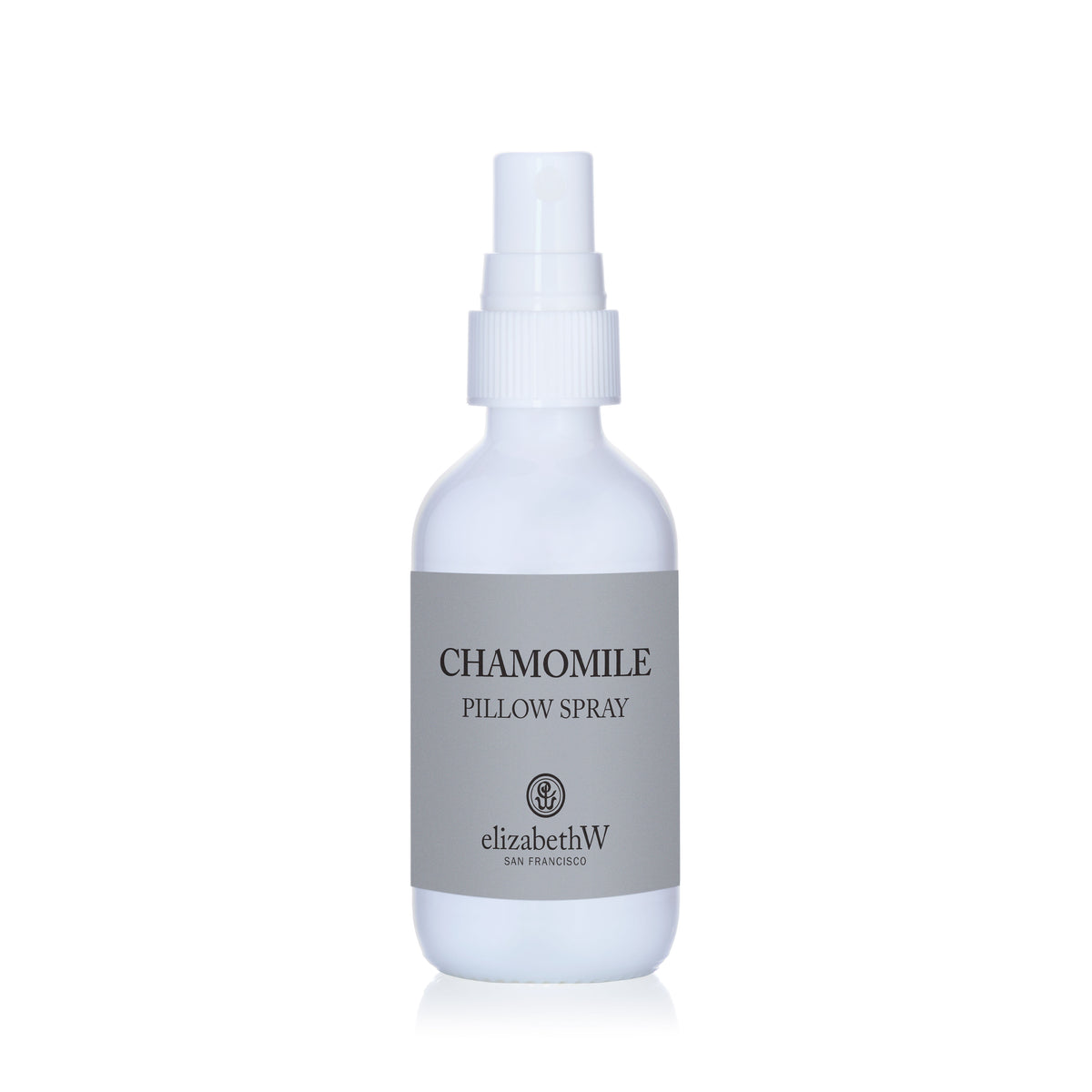 A white spray bottle with a gray label reading “CHAMOMILE PILLOW SPRAY” and the elizabethW brand name below.