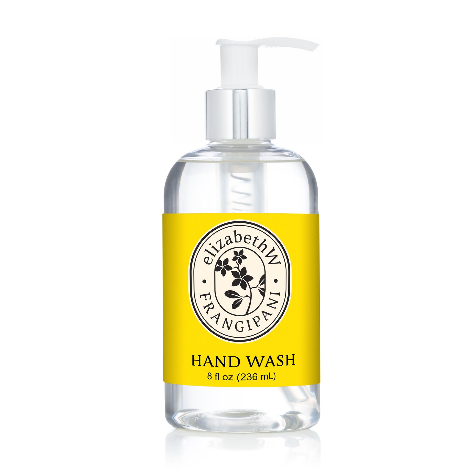 A clear pump bottle of E Wightman & Co Frangipani — Hand Wash with a yellow label displays the brand and product name, plus 8 fl oz (236 mL) volume—an elegant botanical hand wash for daily use.