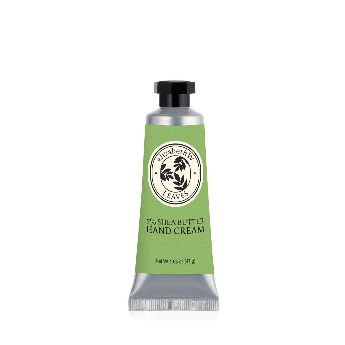 A green tube of E Wightman & Co Leaves — Mini Hand Cream, 1.68 oz, with a black cap and a circular label featuring leaf graphics.