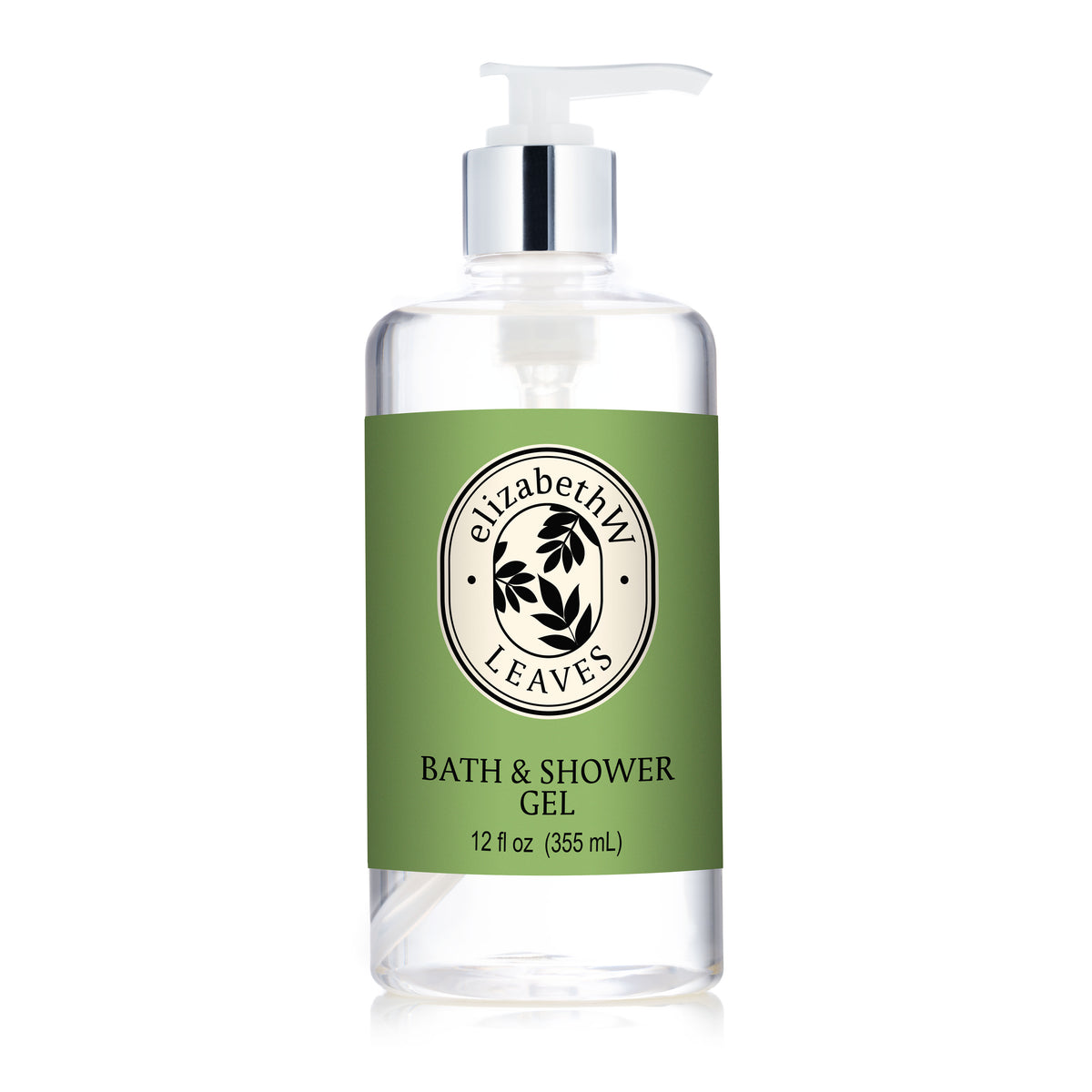 A clear pump bottle labeled "E Wightman & Co Leaves — Bath & Shower Gel, 12 fl oz (355 mL)" sits on a green background. The circular leaf design highlights this refreshing gel for your daily routine.