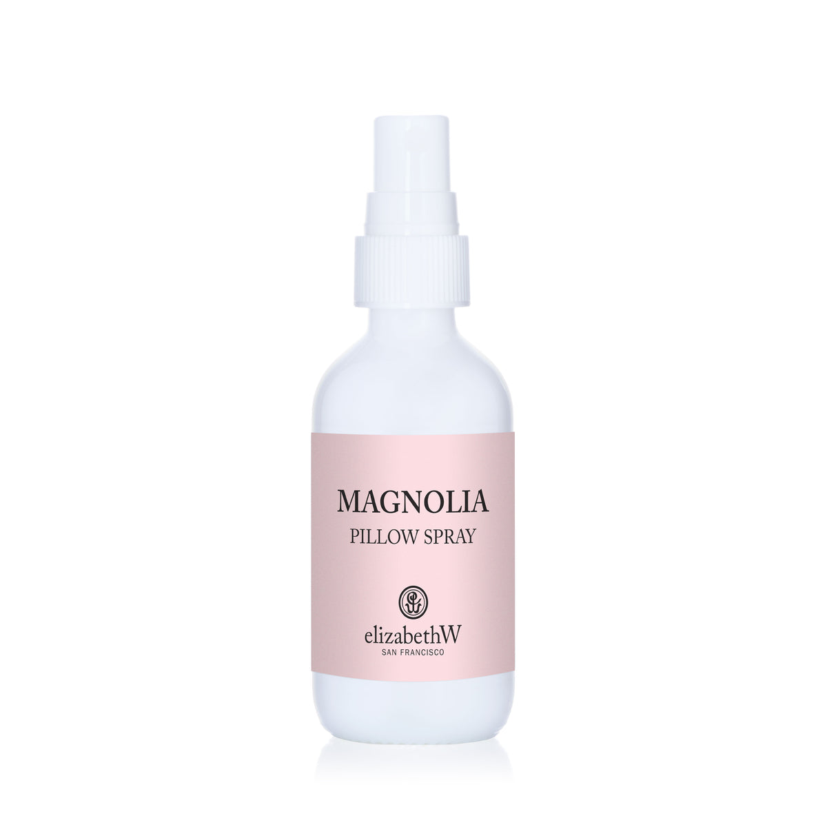 White elizabethW Magnolia Pillow Spray bottle with a pale pink label.