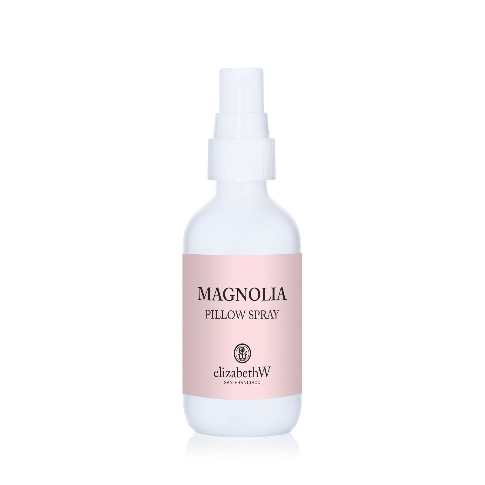White elizabethW Magnolia Pillow Spray bottle with a pale pink label.