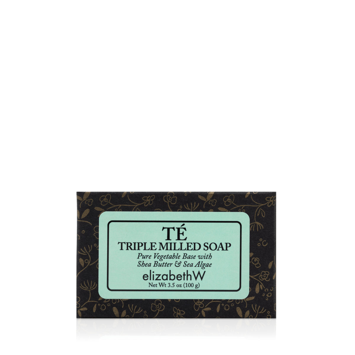 A bar of elizabethW Té — Triple Milled Soap, a luxurious plant-based soap infused with the subtle aroma of oriental black tea, elegantly packaged in a decorative black and gold box featuring a light blue label with detailed ingredients and product information.