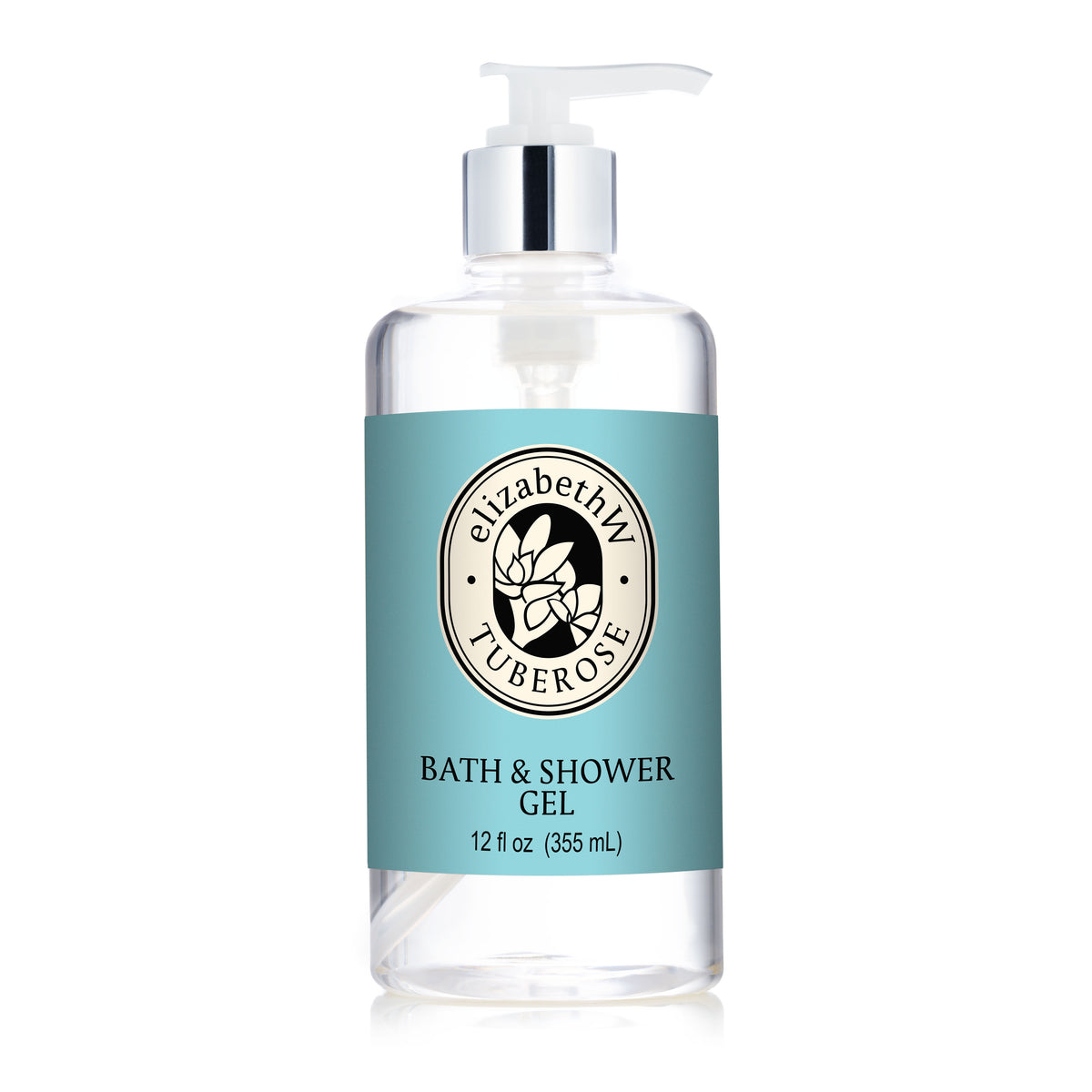 A clear bottle with a pump labeled "Tuberose — Bath & Shower Gel" by E Wightman & Co, 12 fl oz (355 mL), sits on a light blue background with a floral logo. The transparent gel inside promises an indulgent bathing experience.