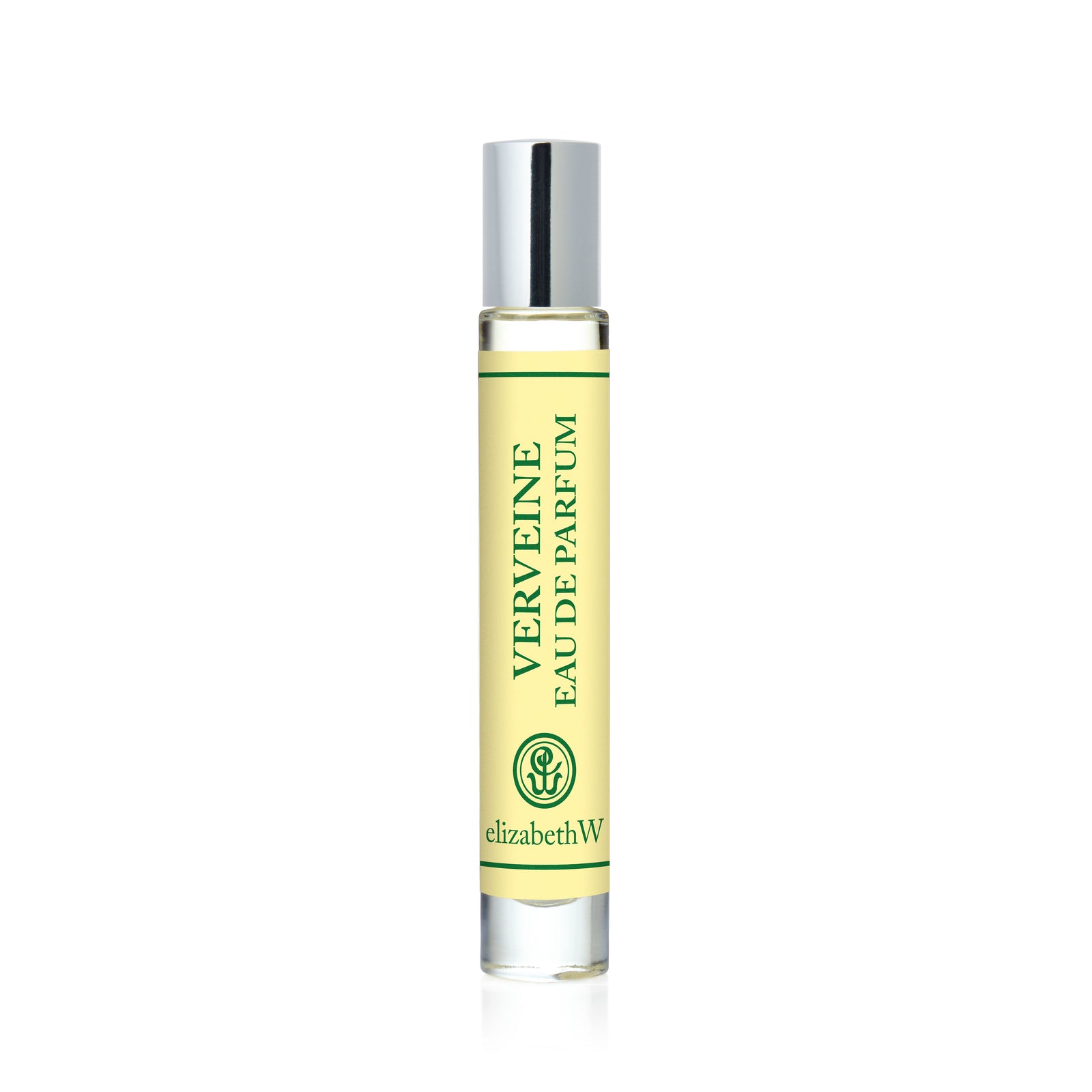 A clear glass rollerball perfume by elizabethW features a silver cap and is labeled "Verveine — Rollerball" in green text, with the elizabethW logo at the bottom. The pale yellow liquid inside perfectly embodies the uplifting Verveine scent with its vibrant citrus fragrance.