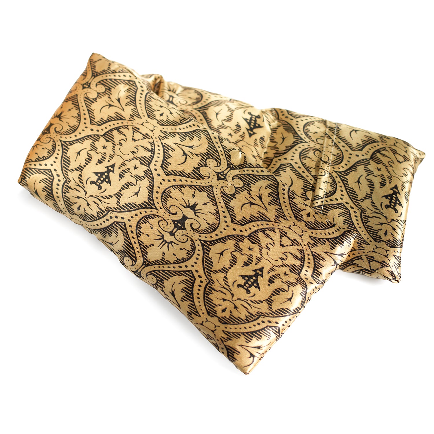 Neatly arranged against a plain white background, the elizabethW Black Gold Damask Hot/Cold Flaxseed Pack features a silk casing with a an intricate black and dark brown pattern, featuring floral and ornate designs, and can be used as a heat pad or cold compress.
