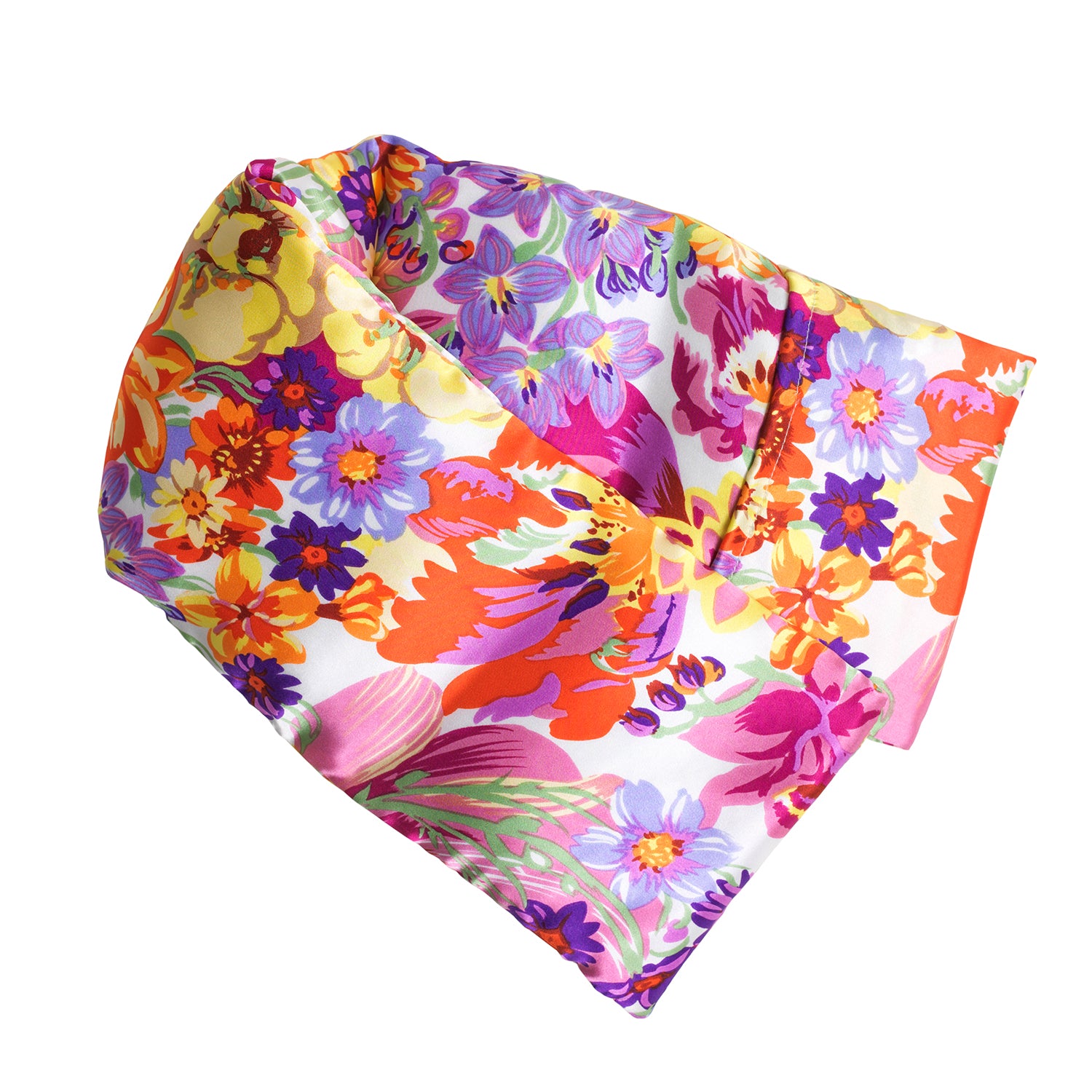 Neatly arranged against a plain white background, the elizabethW Bouquet Hot/Cold Flaxseed Pack is covered in a silk casing with a colorful floral pattern featuring an array of bright, multi-colored flowers, and can be used as a heat pad or cold compress.