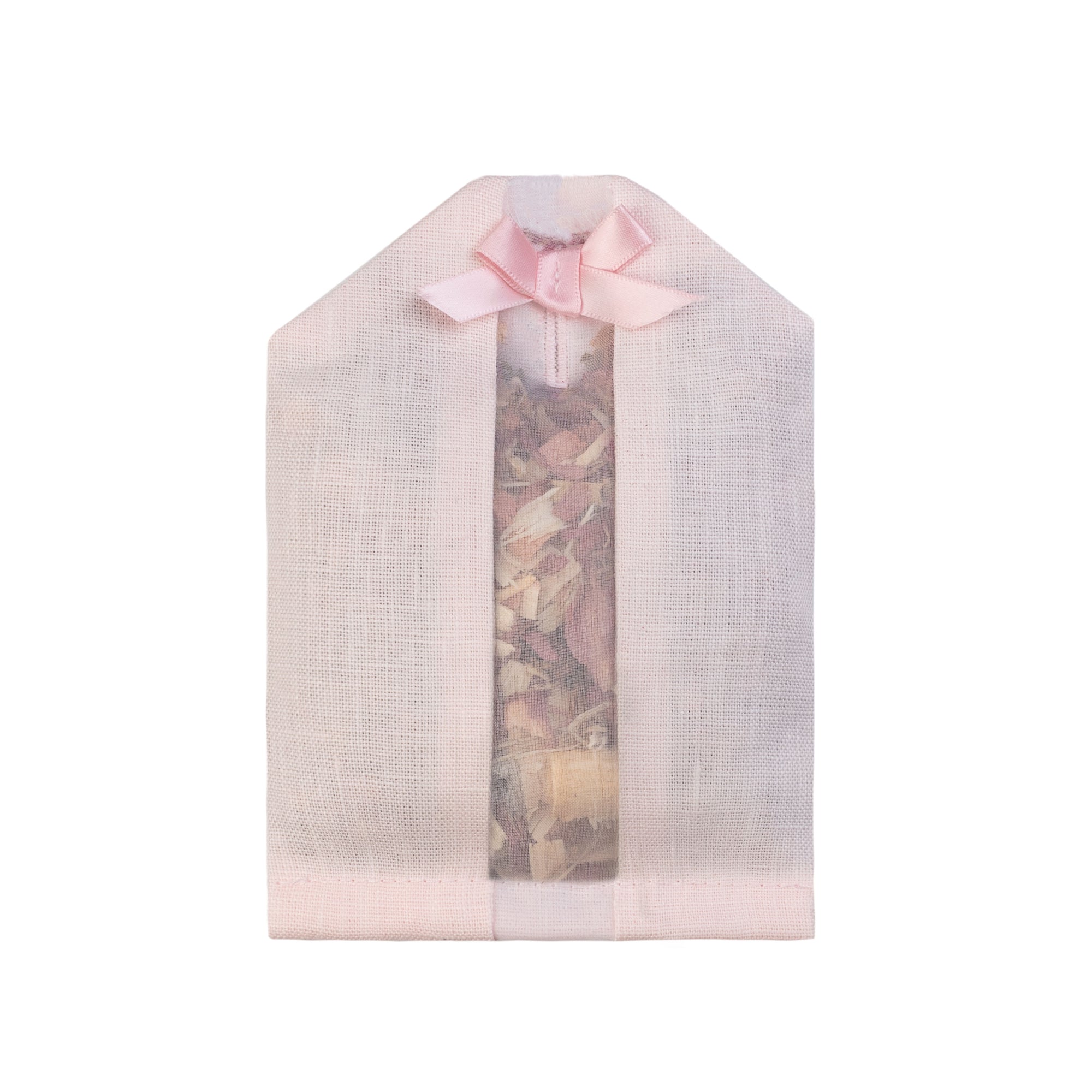 Cedar filled inside of a pink colored linen hanger sachet 