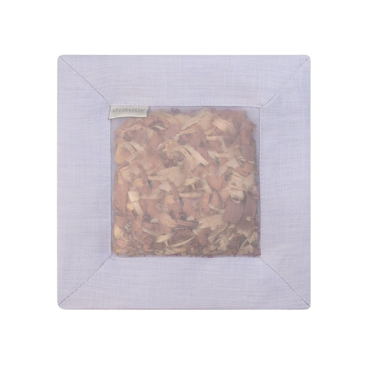 Cedar filled inside of a purple colored square sachet with a transparent screen