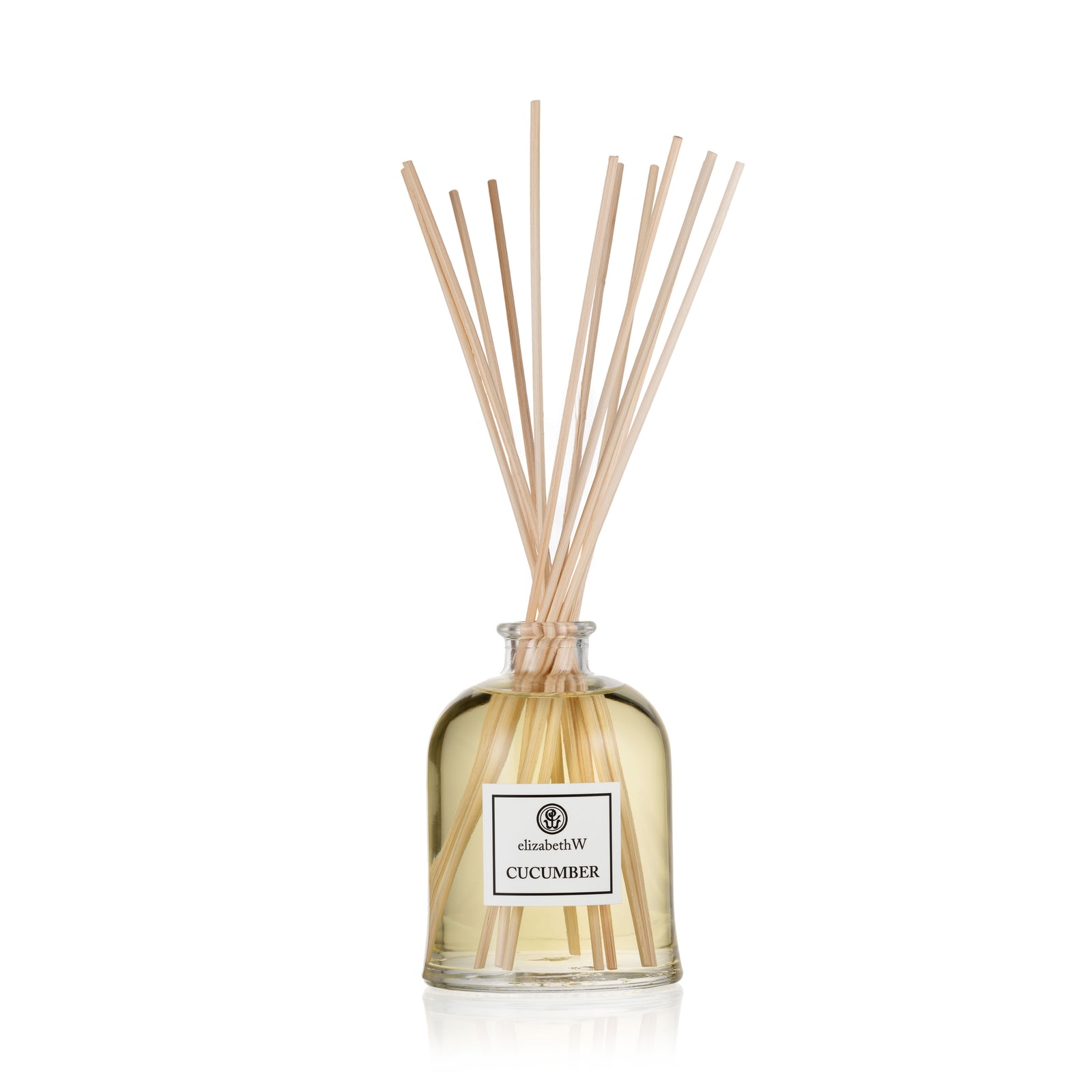 Cucumber Room Diffuser by elizabethW. A clear glass bottle filled with fragrance oil and long diffuser reeds extending from the top.