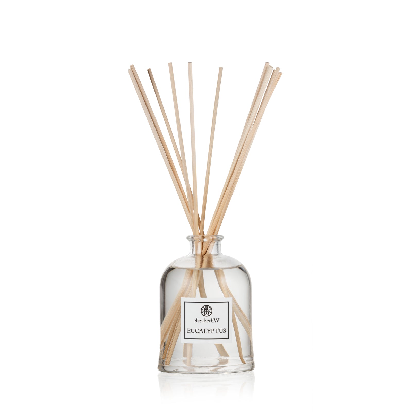 Eucalyptus Room Diffuser by elizabethW. A clear glass bottle filled with fragrance oil and long diffuser reeds extending from the top.