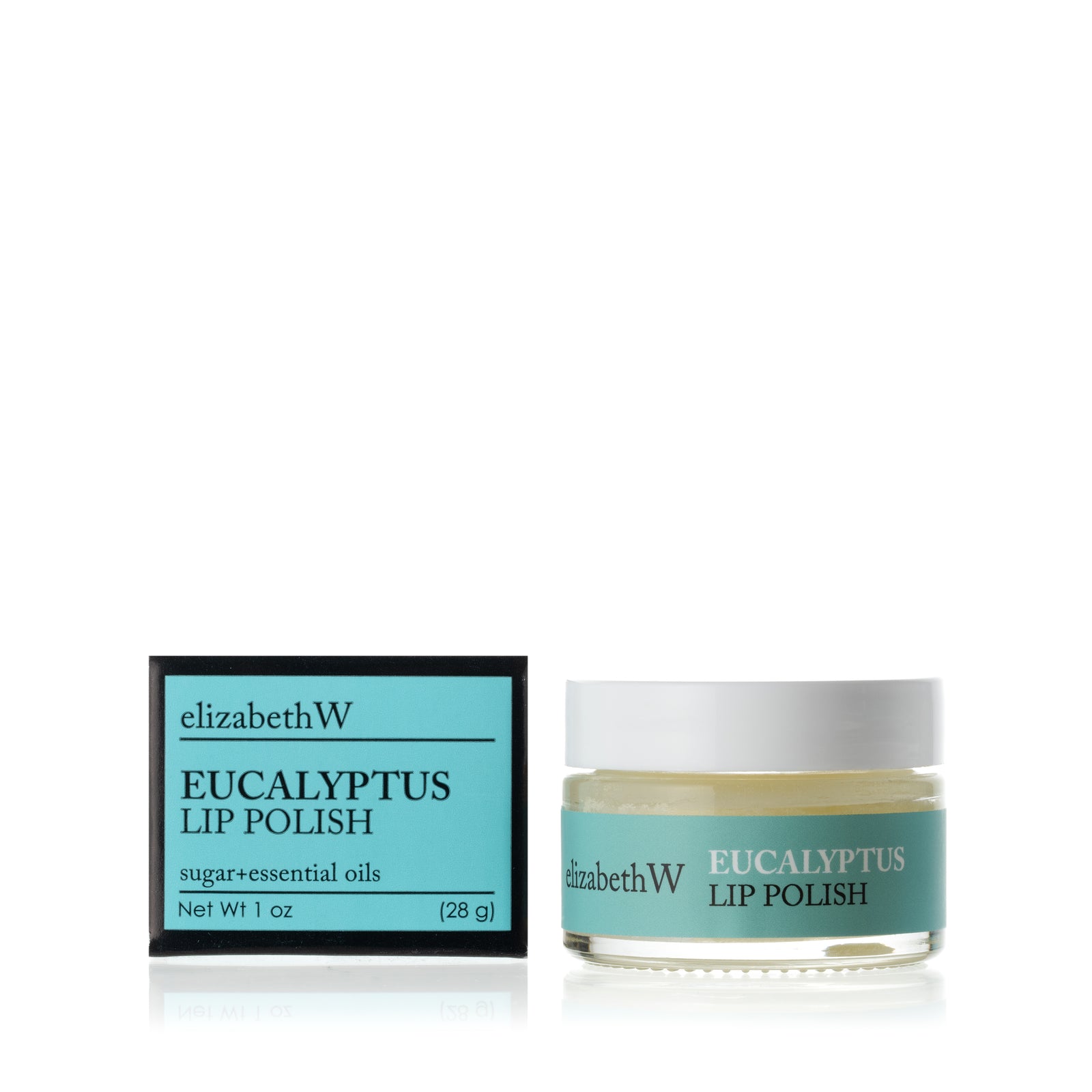 A glass jar of Eucalyptus Lip Polish beside its matching black and blue-green box. The jar contains a smooth white lip polish with a blue-green label.