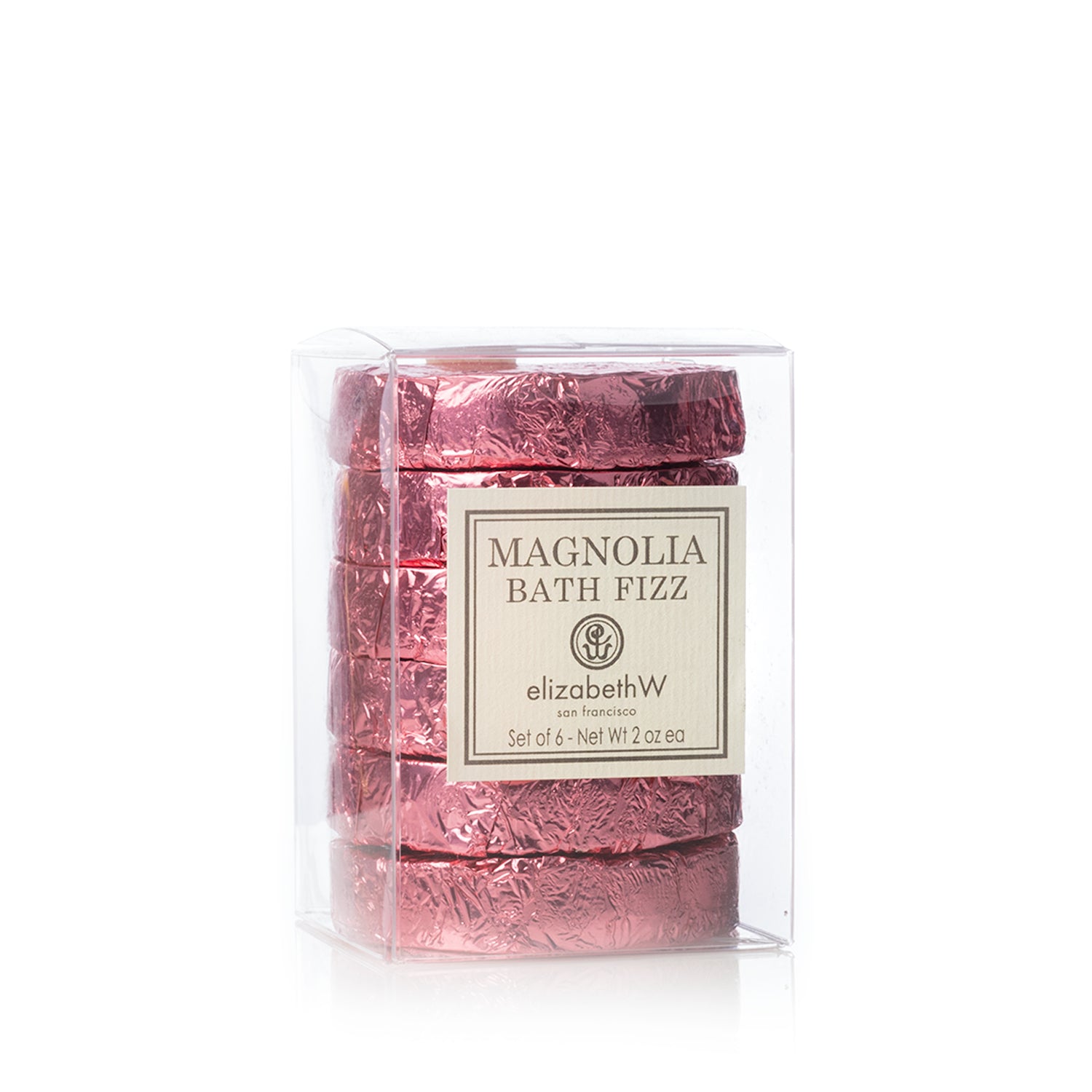 A clear plastic box containing six light pink-wrapped bath fizz tablets. The beige label on the front reads "Magnolia Bath Fizz" with the elizabethW logo and "san francisco." The set is listed as "Set of 6 - Net Wt 2 oz each."