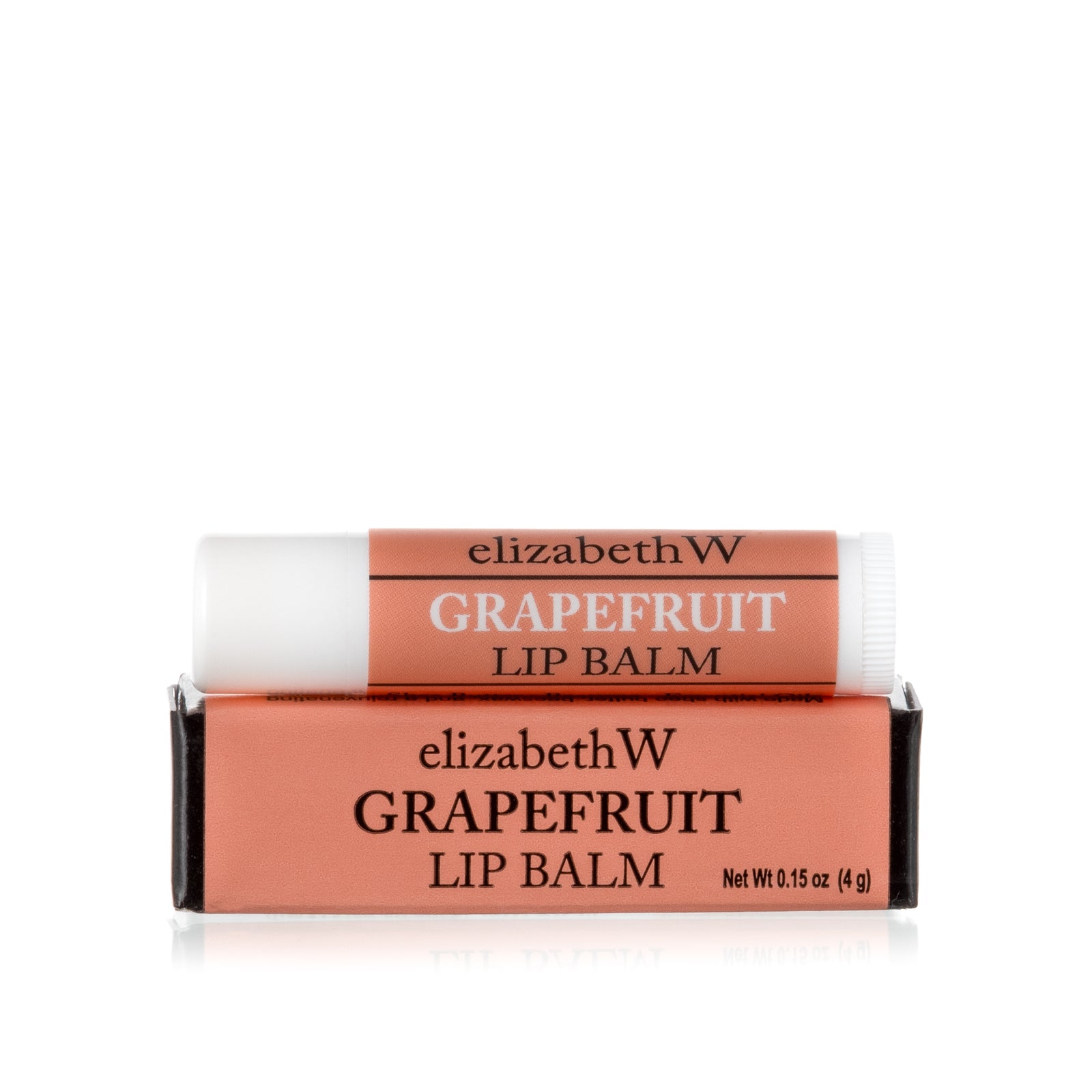 A tube of Grapefruit Lip Balm placed on top of its matching light orange and black box. The tube and box are both labeled with the product name in black text on a light orange background.