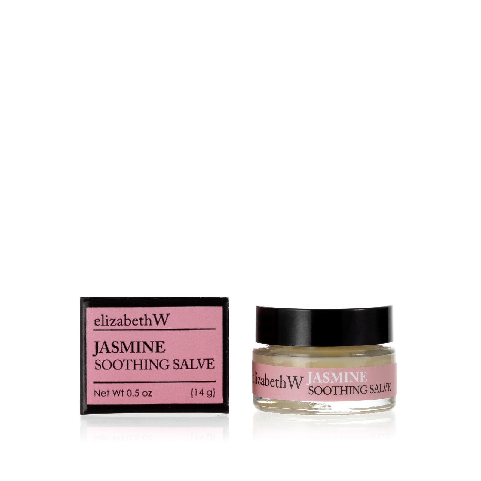 .5 oz (14g) glass jar of Jasmine Soothing Salve with a matching pink and black box. The jar contains salve, and the box displays the product name and the brand elizabethW in black text on a pink background.