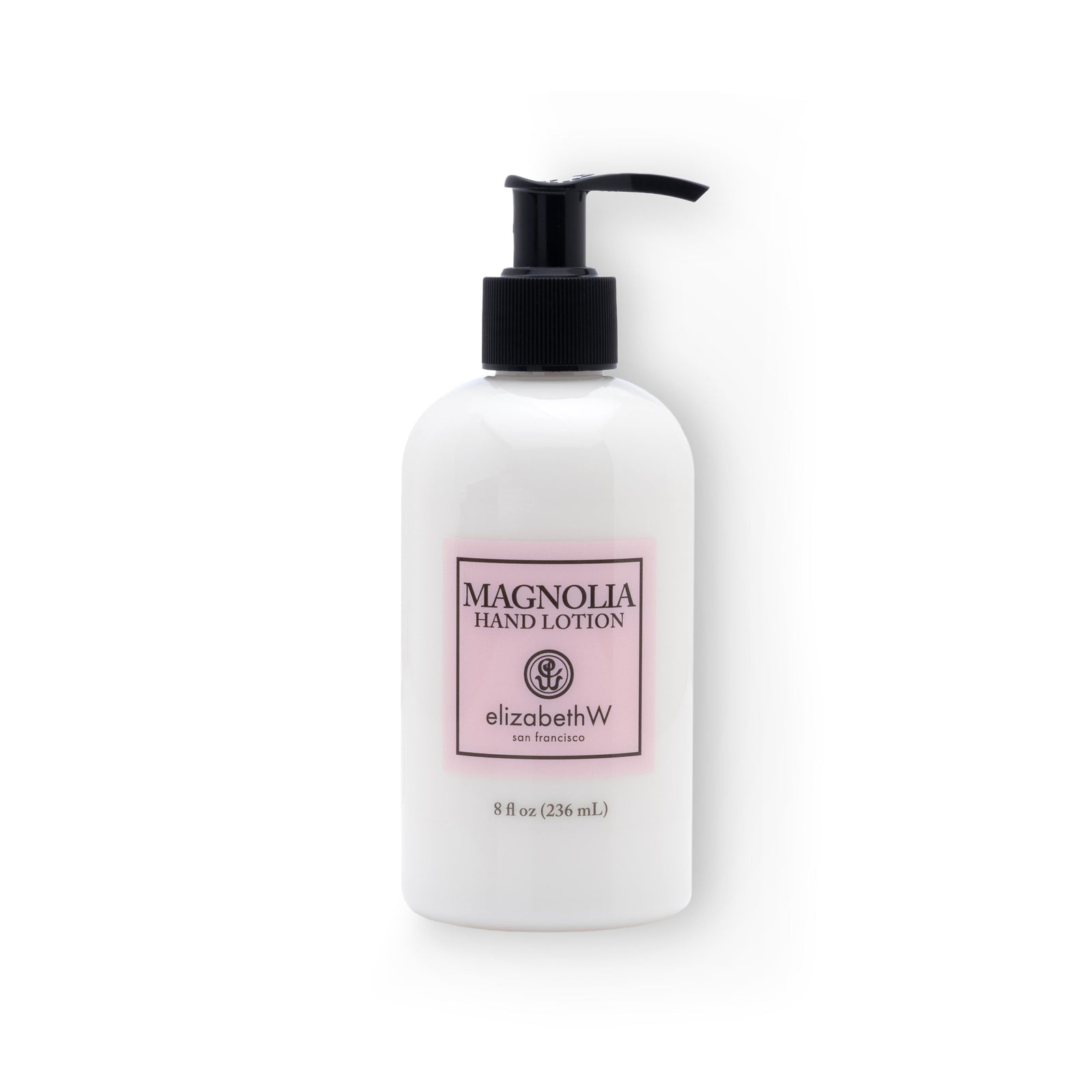 A clear 8 fl oz (236 mL) plastic bottle of white, Magnolia hand lotion with a black pump dispenser. The light pink label reads "Magnolia Hand Lotion" with the elizabethW logo and "san francisco."
