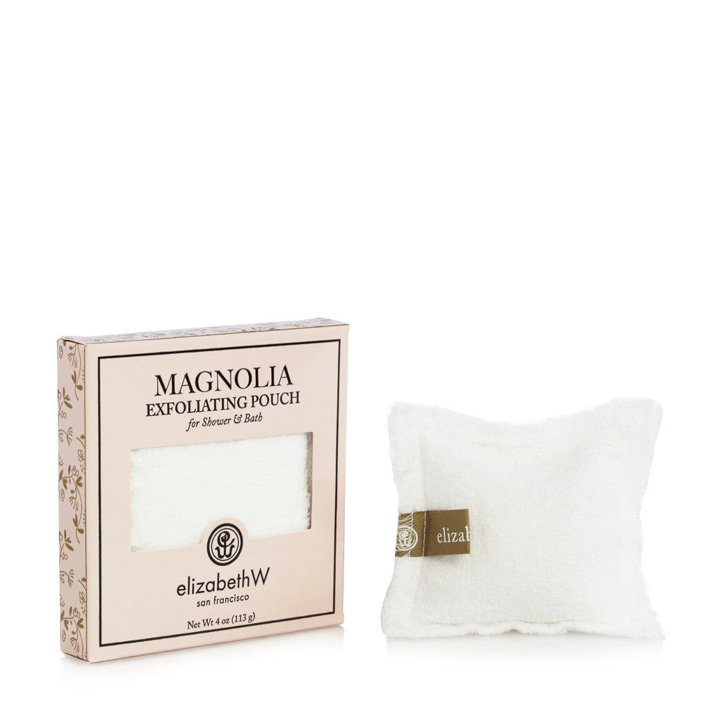 A 4 oz (113 g) exfoliating pouch for shower and bath. The product is shown next to its soft pink box. The box reads "Magnolia Exfoliating Pouch for Shower & Bath" with the elizabethW logo and "san francisco." The pouch itself is a white terry cloth square with a small fabric tag displaying the brand "elizabethW."