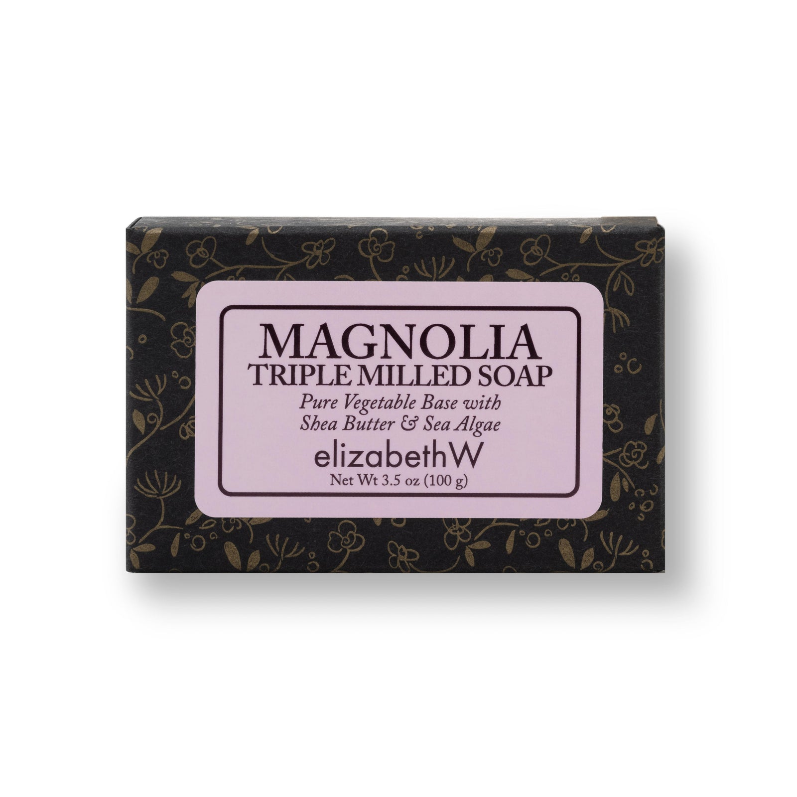 A rectangular box of Magnolia triple milled soap in black packaging with floral accents. The soft pink label reads "Magnolia Triple Milled Soap" followed by "Pure Vegetable Base with Shea Butter & Sea Algae." The elizabethW logo is displayed beneath, with "san francisco" and "Net Wt 3.5 oz (100 g).