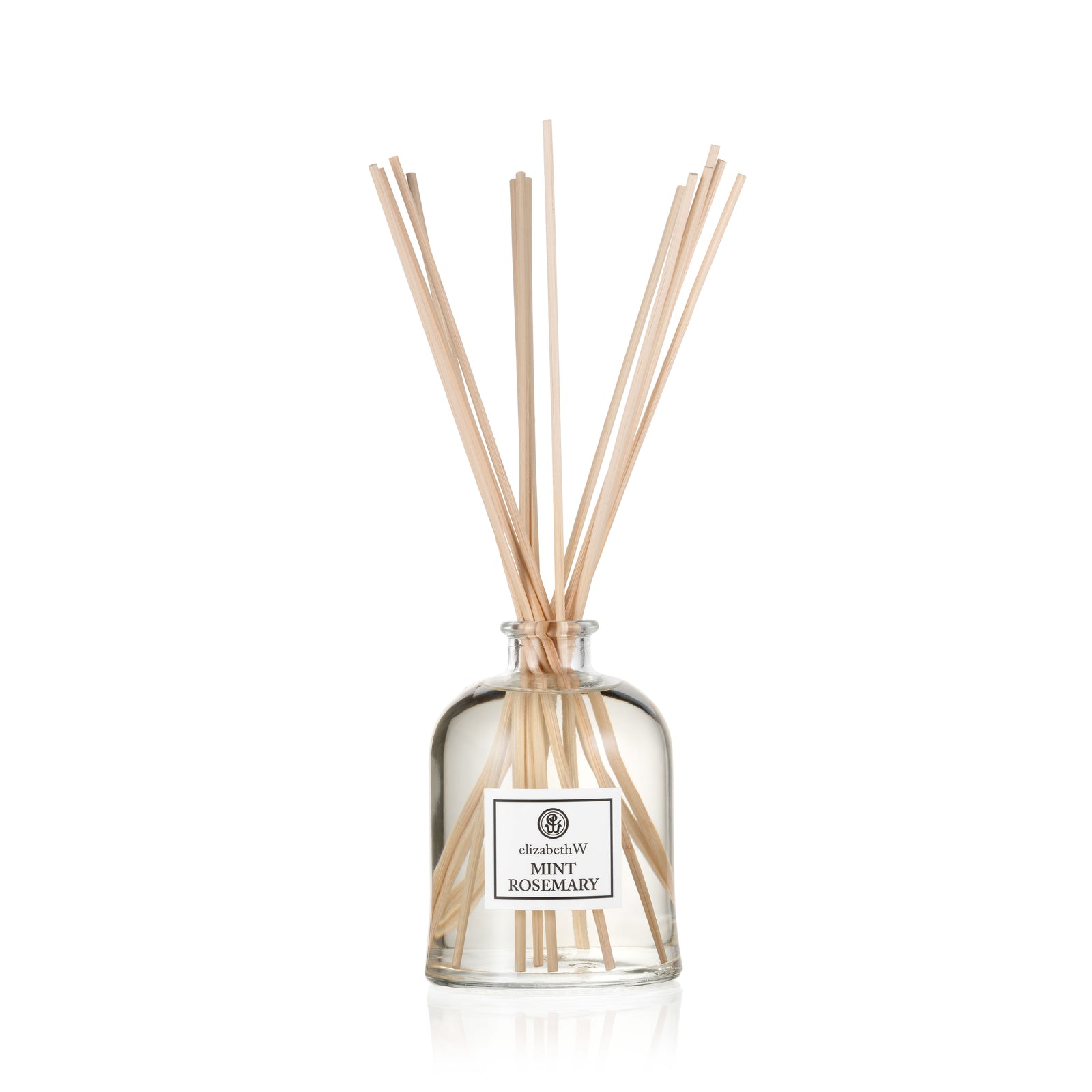 Mint|Rosemary Room Diffuser by elizabethW. A clear glass bottle filled with fragrance oil and long diffuser reeds extending from the top.