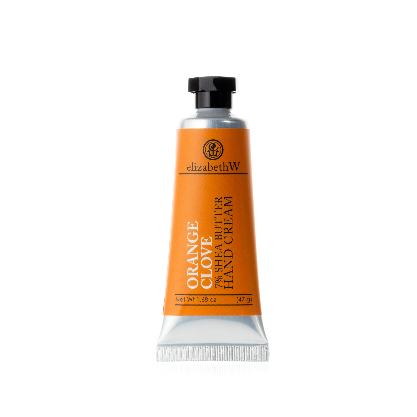 A small metal tube of Orange Clove 7% Shea Butter Hand Cream with a black cap and a orange label, showing the product’s name and weight.