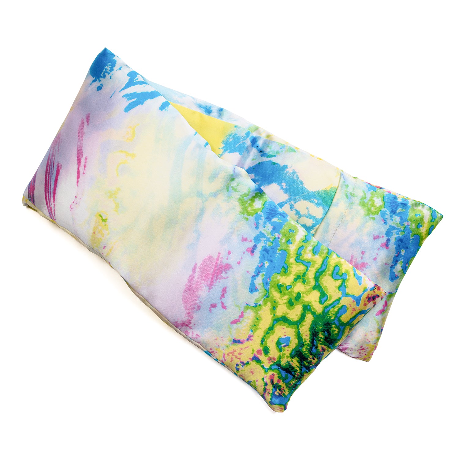 Neatly arranged against a plain white background, the elizabethW Reflections Hot/Cold Flaxseed Pack, displays a mix of vibrant watercolor splashes and intricate swirls, covered in a silk casing, and can be used as a heat pad or cold compress. 