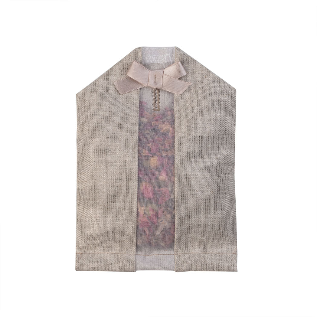 Dried rose petals filled inside of a "natural" colored linen hanger sachet 