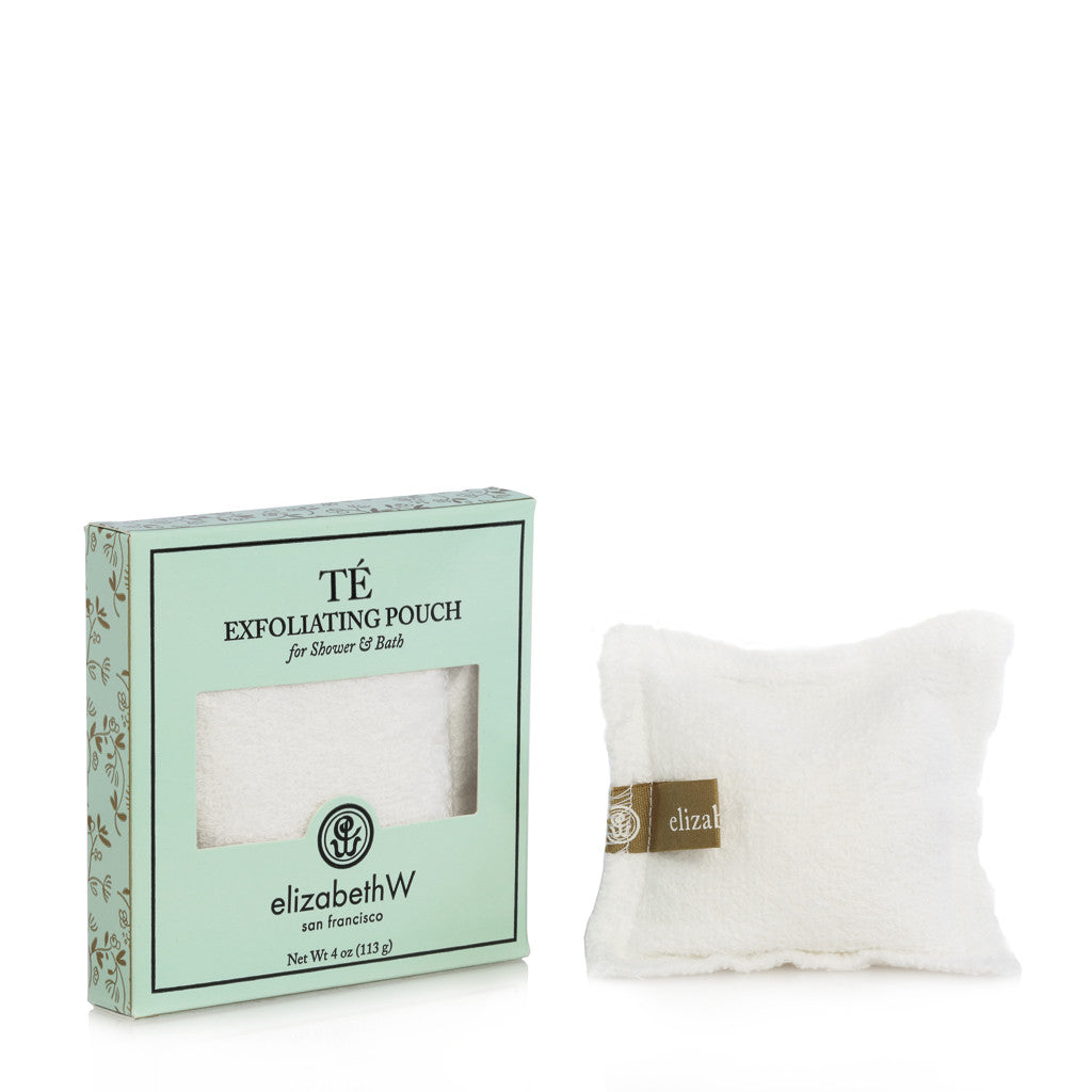 A 4 oz (113 g) exfoliating pouch for shower and bath. The product is shown next to its teal box. The box reads "TE Exfoliating Pouch for Shower & Bath" with the elizabethW logo and "san francisco." The pouch itself is a white terry cloth square with a small fabric tag displaying the brand "elizabethW."