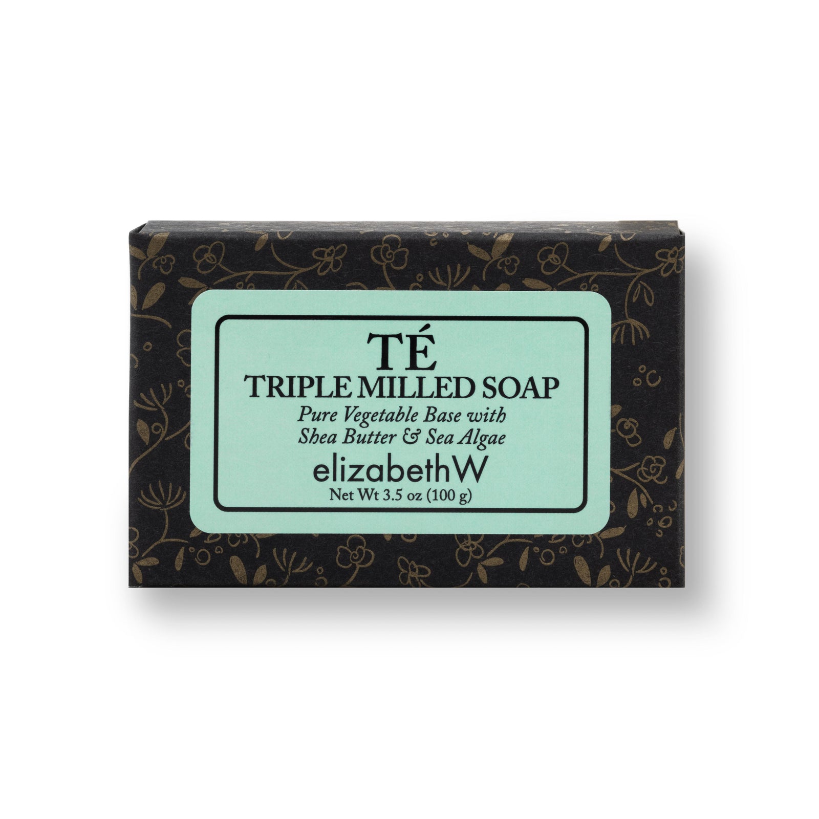 A rectangular box of TE triple milled soap in black packaging with floral accents. The teal label reads "TE Triple Milled Soap" followed by "Pure Vegetable Base with Shea Butter & Sea Algae." The elizabethW logo is displayed beneath, with "san francisco" and "Net Wt 3.5 oz (100 g).