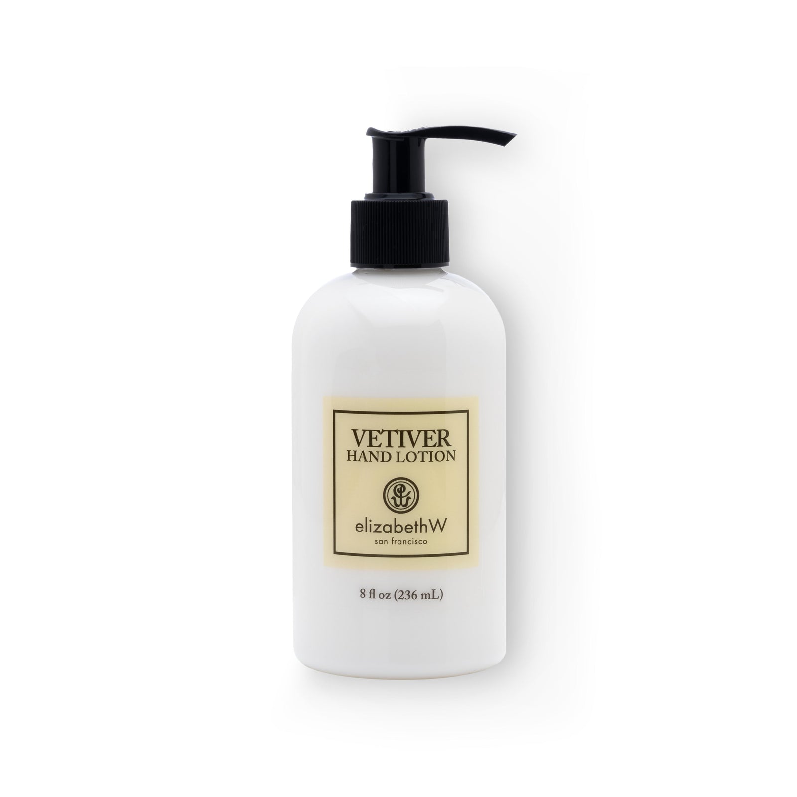A clear 8 fl oz (236 mL) plastic bottle of white, Vetiver hand lotion with a black pump dispenser. The cream label reads "Vetiver Hand Lotion" with the elizabethW logo and "san francisco."